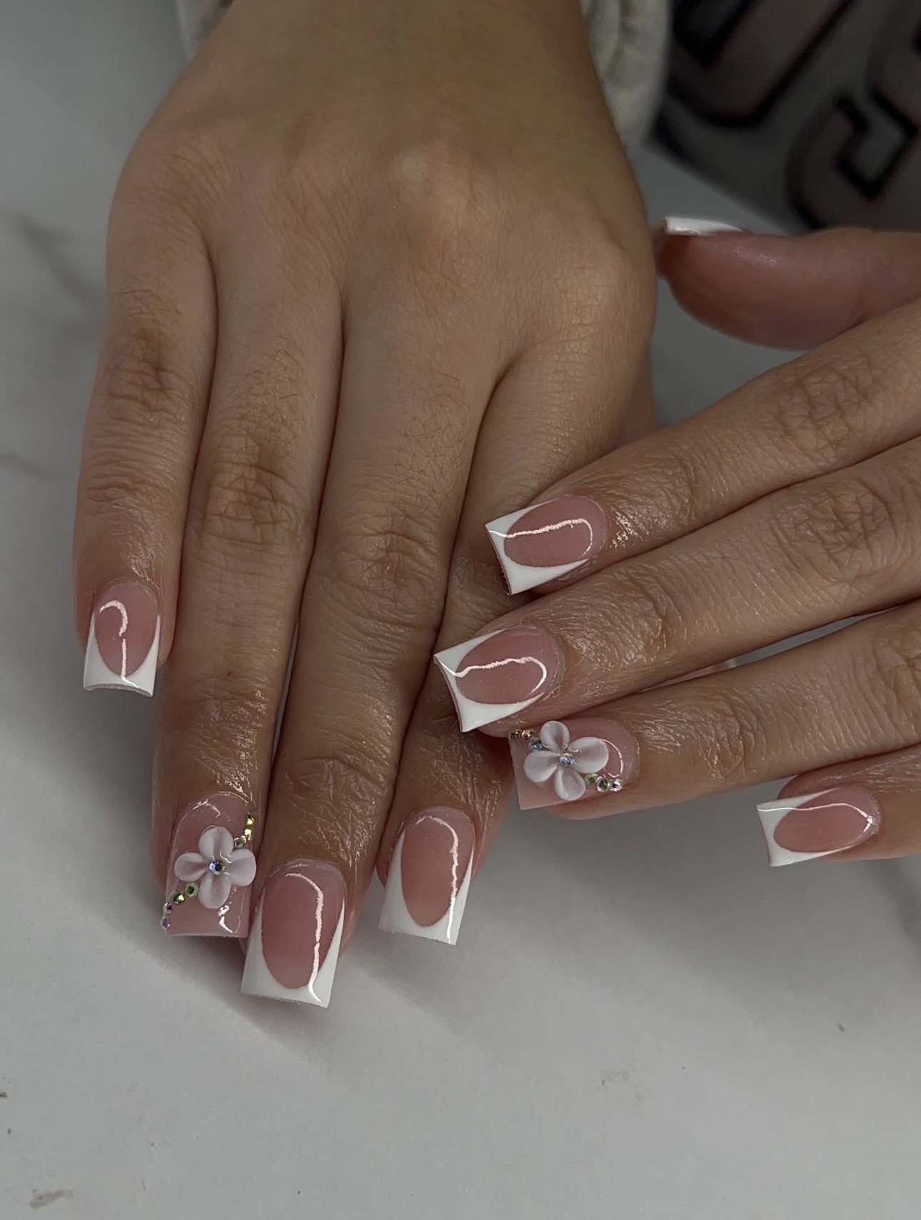 Soft pink square French tips with 3D white flowers & crystals